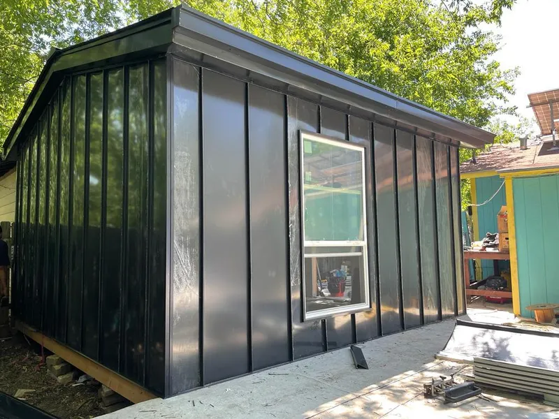 Black standing seam metal wall panels for Roof Inspection in Skaneateles