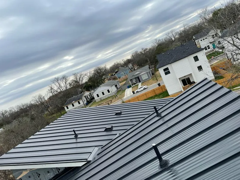 Standing seam metal roof panels with vents for Skylight Repair in Skaneateles